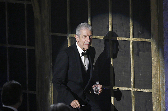 Canadian singer and songwriter Leonard Cohen walks to stage at 23rd annual Rock and Roll Hall of Fame induction ceremony in New York